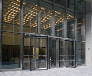 Revolving entrance door system for The Zig Zag Building