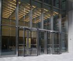 Revolving entrance door system for The Zig Zag Building