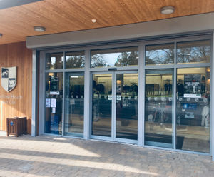 Bi-parting automatic sliding entrance doors - golf club