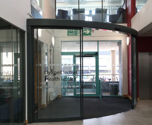 Quiet automatic door system for university library