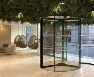 Glass revolving entrance solution for innovative office