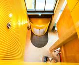 Curved automatic entrance pods welcome co-workers - on this page
