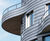 RHEINZINK zinc cladding creates curved facade 0