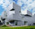 Zinc Angled Standing Seam clads geometric building 1
