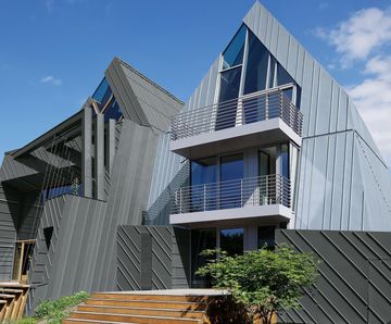 RHEINZINK prePATINA zinc alloy facade and roof cladding