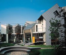 Angled standing seam facade and roofing for Iuxury flats