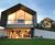 Zinc facade and roof cladding for new barn-style home 1