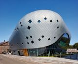 Zinc cladding for roof and facade of futuristic building - on this page