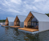 RHEINZINK-prePATINA roof and facade for lake-side hotel - on this page