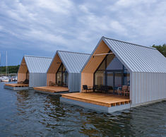 RHEINZINK-prePATINA roof and facade for lake-side hotel