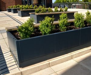 Aluminium planters with benches - Newman University