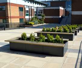 Aluminium planters with benches - Newman University