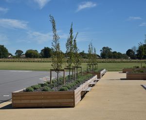 Planters with integrated seating