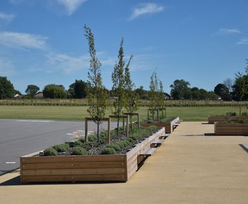 Planters with integrated seating