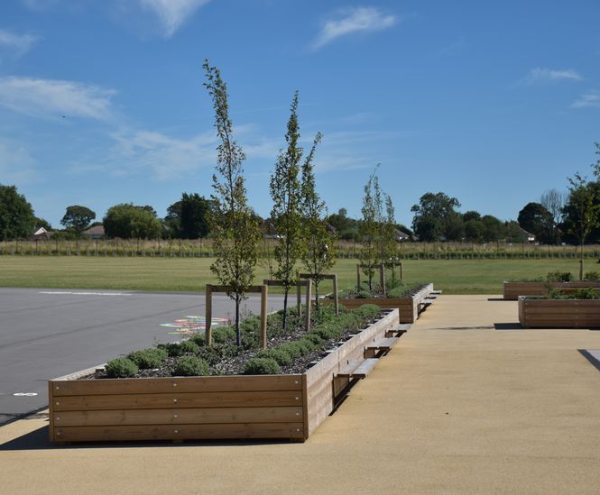 Planters with integrated seating