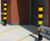 Steel bollard with black and yellow high-visibility hazard bands 4