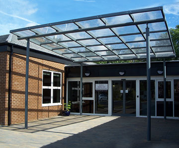 Brandon - freestanding steel canopy shelter with polycarbonate roof