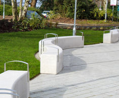 Curved concrete benches for The Christie's Entrance