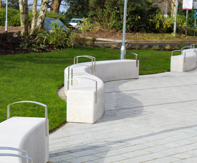 Curved concrete benches for The Christie's Entrance