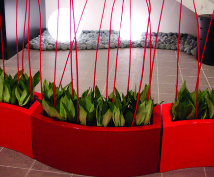 Curvy Trough - fiberglass outdoor planters for modern landscaping