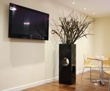 Tower Geo Design - tall fiberglass planter for modern outdoor spaces - on this page