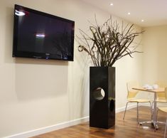 Tower Geo Design - tall fiberglass planter for modern outdoor spaces