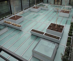 Engineered lightweight planters for glass roof garden