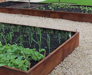 Corten steel finish planters for award-winning garden