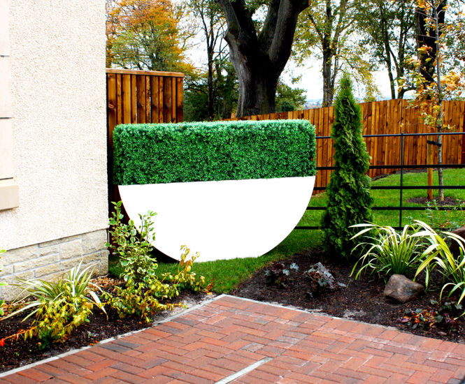 Bespoke Dhow planters with Buxus hedge