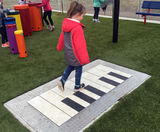 Outdoor Piano Features in School's Inclusive Playground - on this page