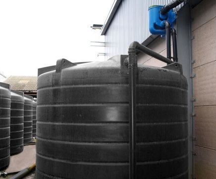 Rainwater harvesting storage tanks for new farm building