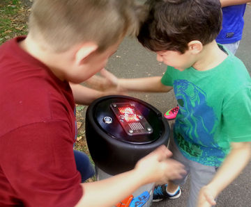 Gamenetic interactive, inclusive play terminal with 5 games