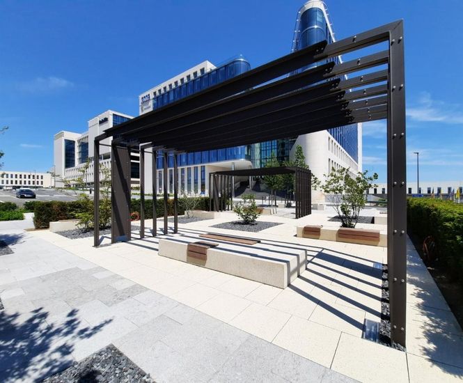 Concrete paving, seating and bollards for airport refurb