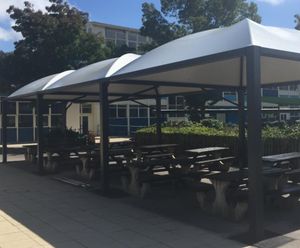 Sheltered canopies for school outdoor eating area