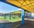 Covered walkway canopy links primary school classrooms 0