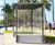Self - freestanding steel and glass waiting shelter with concrete base 2