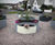 Black and white planters brighten central community area 5