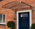 Type D arched polycarbonate door canopy - DDA-compliant