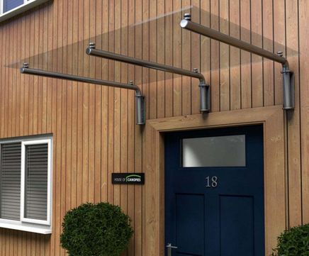Type M glass door canopy with tubular s/steel brackets