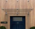 Type P glass door canopy - DDA-compliant