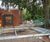 Carport built over RPA using tree root bridge 5
