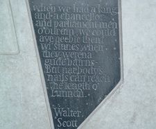 Easdale slate panel in Canongate wall