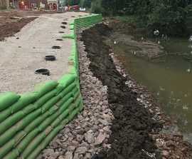 Rootlok system for vegetated retaining wall on footway | GeoGrow | ESI ...