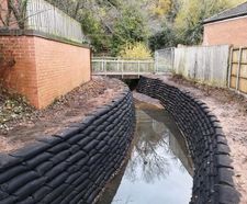 Storm drainage channel restoration using Rootlok