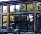 Glass Bi-Fold GlassIIEdge™ and aluminium doors