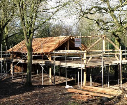 Round timber woodland barn