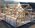 Bespoke roundwood T-shaped barn for weddings and events