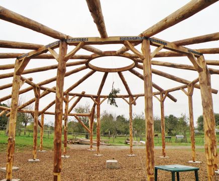 16m-diameter bespoke timber roundhouse with sedum roof