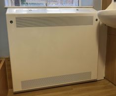 Anti-ligature radiator covers with IP3x-compliant grille