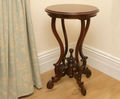 Polished birdcage wine table